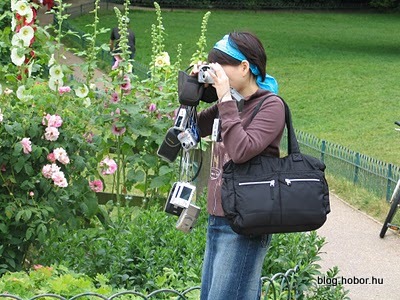 BRIGHTON, East Sussex, UK -  Tourist in the garden of the Royal Pavilion